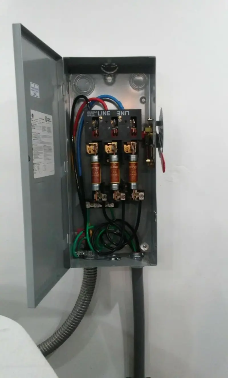 Three-phase disconnect switch installed for Smoke Detector Installation in Canton
